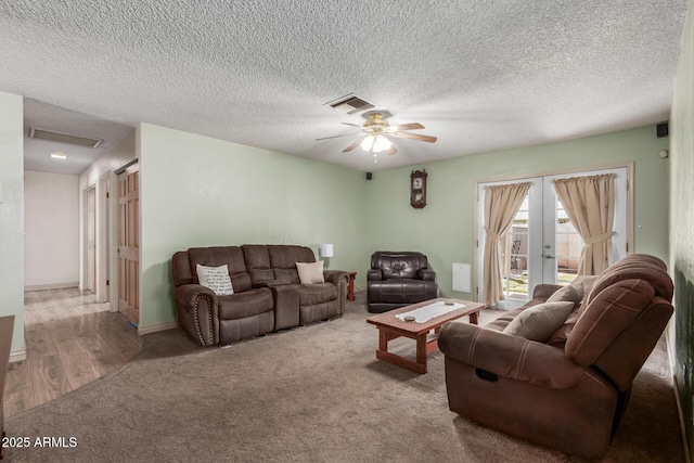 2003 W Tyson St, Chandler, AZ 85224 - carpeted living area featuring a ceiling fan, french doors, a textured ceiling, and visible vents
