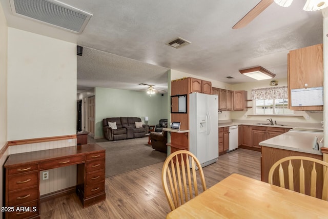2003 W Tyson St, Chandler, AZ 85224 - kitchen featuring white appliances, a ceiling fan, open floor plan, and visible vents
