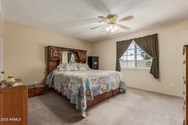 2003 W Tyson St, Chandler, AZ 85224 - bedroom featuring a ceiling fan, a textured ceiling, and light carpet