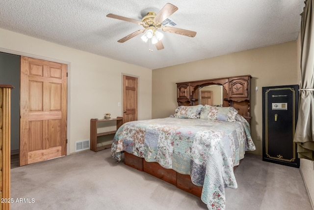 2003 W Tyson St, Chandler, AZ 85224 - carpeted bedroom with visible vents, a ceiling fan, and a textured ceiling