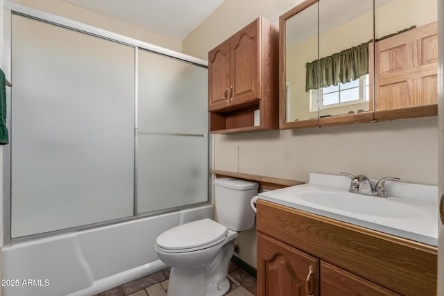 2003 W Tyson St, Chandler, AZ 85224 - full bathroom with shower / bath combination with glass door, toilet, tile patterned floors, and vanity