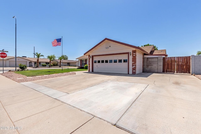 2003 W Tyson St, Chandler, AZ 85224 - ranch-style home featuring an attached garage, fence, driveway, and brick siding