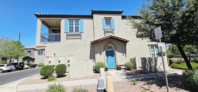 4705 E Red Oak Ln Unit 101, Gilbert, AZ 85297 - view of front of home with a tiled roof and stucco siding
