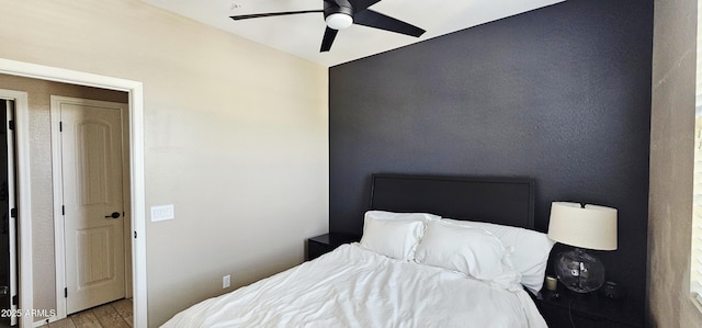 4705 E Red Oak Ln Unit 101, Gilbert, AZ 85297 - bedroom with wood finished floors and a ceiling fan