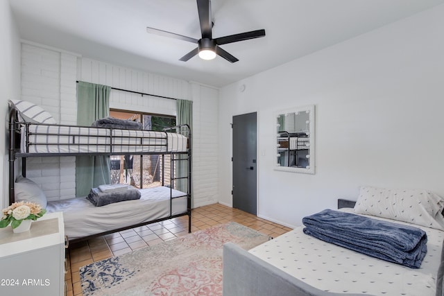 bedroom featuring ceiling fan and light tile patterned floors