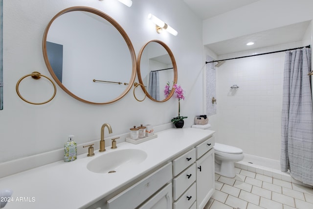 bathroom with tile patterned floors, toilet, vanity, and a shower with shower curtain