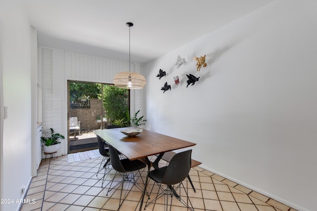 dining room with light tile patterned flooring