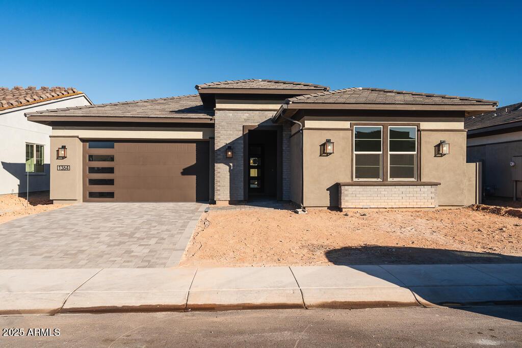 prairie-style home with a garage