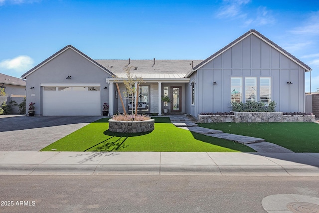1439 E Mead Dr, Gilbert, AZ 85298 - ranch-style home with board and batten siding, a garage, a front lawn, and driveway
