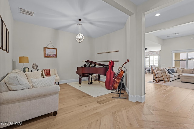 1439 E Mead Dr, Gilbert, AZ 85298 - living room with baseboards, recessed lighting, light wood-style floors, and a chandelier