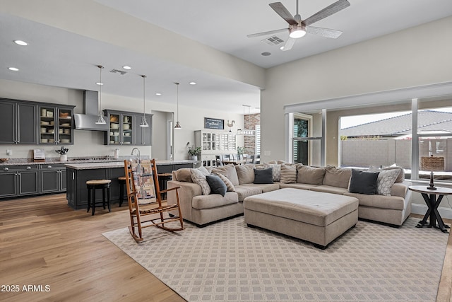 1439 E Mead Dr, Gilbert, AZ 85298 - living room featuring light wood finished floors, ceiling fan, and recessed lighting