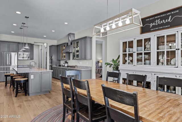 1439 E Mead Dr, Gilbert, AZ 85298 - dining space with recessed lighting and light wood-type flooring