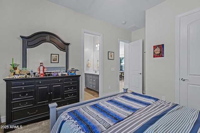 1439 E Mead Dr, Gilbert, AZ 85298 - bedroom featuring ensuite bath, baseboards, and a sink