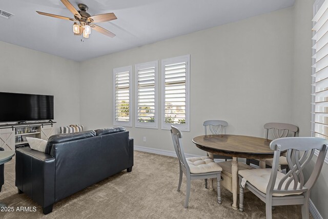 1439 E Mead Dr, Gilbert, AZ 85298 - living area featuring light carpet, a ceiling fan, and baseboards