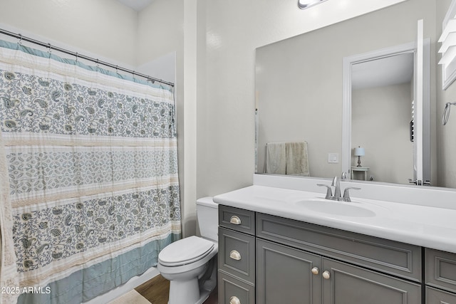 1439 E Mead Dr, Gilbert, AZ 85298 - bathroom with toilet, vanity, curtained shower, and wood finished floors