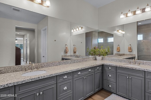 1439 E Mead Dr, Gilbert, AZ 85298 - bathroom with double vanity and wood finished floors