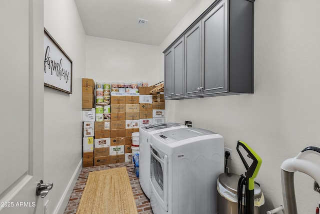 1439 E Mead Dr, Gilbert, AZ 85298 - clothes washing area featuring independent washer and dryer, cabinet space, and brick flooring