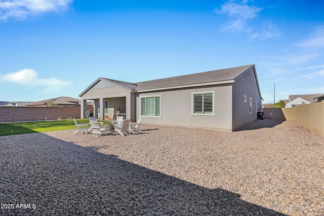 1439 E Mead Dr, Gilbert, AZ 85298 - back of property featuring a fenced backyard and a patio