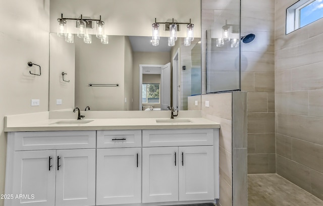 3367 W Lyra Way, Flagstaff, AZ 86001 - bathroom with a walk in shower, double vanity, and plenty of natural light