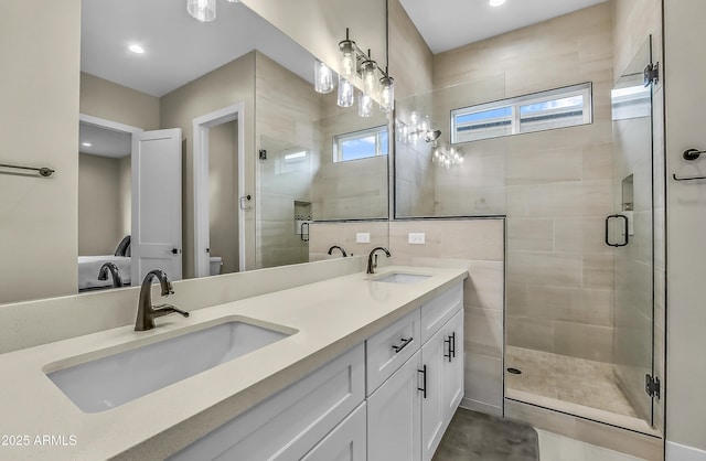 3367 W Lyra Way, Flagstaff, AZ 86001 - bathroom featuring a shower stall, double vanity, and toilet