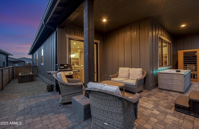 3367 W Lyra Way, Flagstaff, AZ 86001 - fenced backyard featuring a patio, a grill, and an outdoor hangout area
