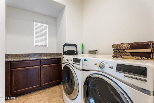 laundry room with washer and dryer