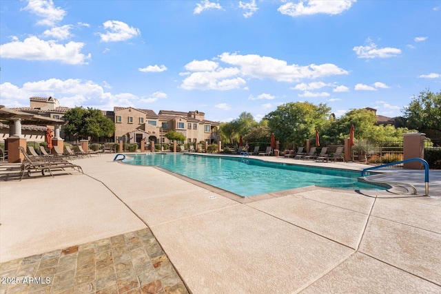 view of pool featuring a patio and a pergola