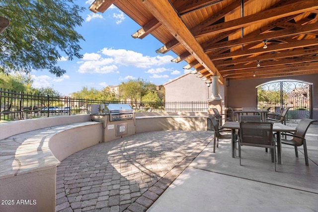 view of patio featuring grilling area and an outdoor kitchen