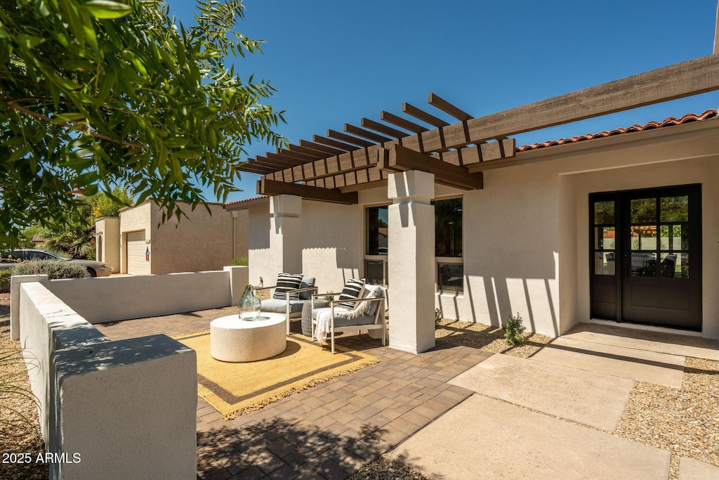 7618 N Via Del Paraiso, Scottsdale, AZ 85258 - view of patio featuring a pergola and an outdoor hangout area