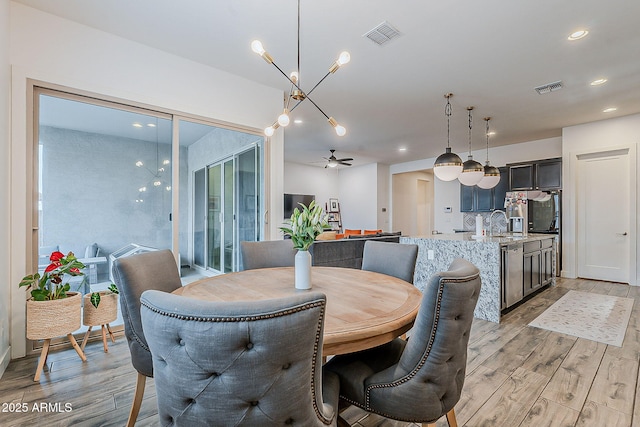 dining room featuring recessed lighting, visible vents, a ceiling fan, and light wood finished floors