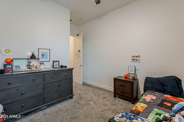 carpeted bedroom with baseboards