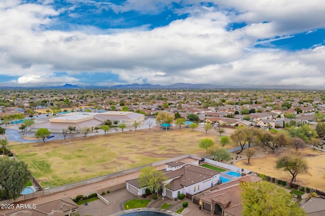 birds eye view of property with a residential view and a mountain view