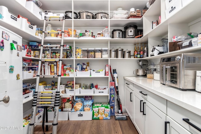 storage area featuring a toaster