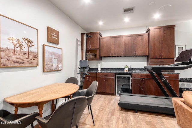 kitchen featuring visible vents, wine cooler, light wood-type flooring, recessed lighting, and open shelves