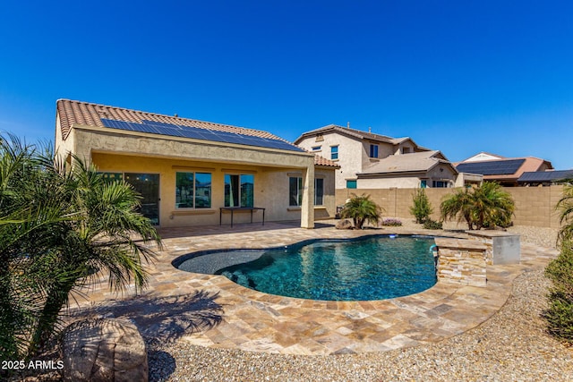 view of swimming pool featuring a patio area, a fenced backyard, and a fenced in pool