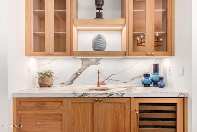 16227 N 63rd Pl, Scottsdale, AZ 85254 - bar area featuring backsplash, beverage cooler, and a sink