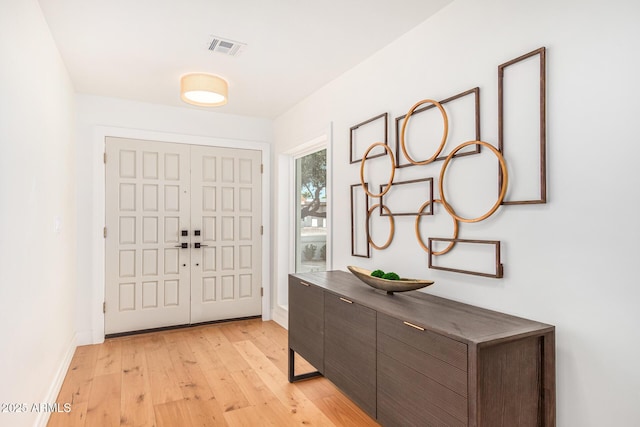16227 N 63rd Pl, Scottsdale, AZ 85254 - entrance foyer featuring light wood-style flooring and baseboards