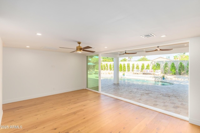 16227 N 63rd Pl, Scottsdale, AZ 85254 - empty room with hardwood / wood-style floors, ceiling fan, recessed lighting, and baseboards
