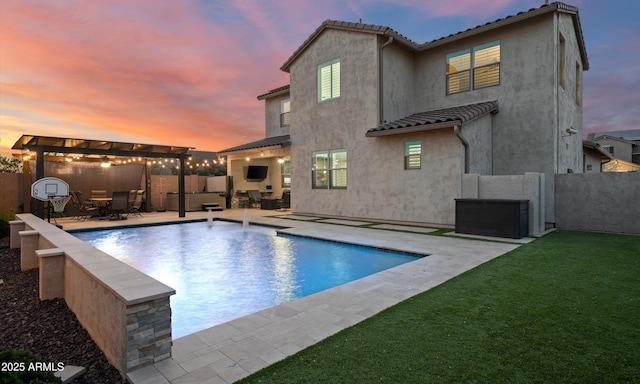 2915 W Night Owl Ln, Phoenix, AZ 85085 - pool at dusk with a pergola, a patio area, and outdoor lounge area