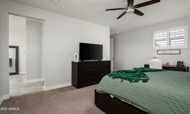 2915 W Night Owl Ln, Phoenix, AZ 85085 - bedroom featuring light carpet, baseboards, and a ceiling fan