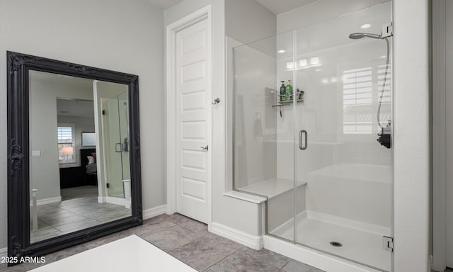 2915 W Night Owl Ln, Phoenix, AZ 85085 - ensuite bathroom with a stall shower and baseboards