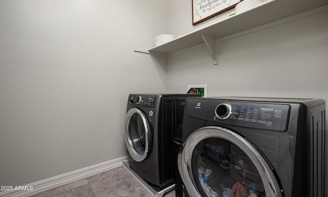 2915 W Night Owl Ln, Phoenix, AZ 85085 - laundry room with baseboards and separate washer and dryer