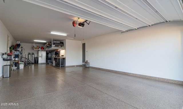 2915 W Night Owl Ln, Phoenix, AZ 85085 - garage with a garage door opener and baseboards