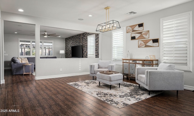 2915 W Night Owl Ln, Phoenix, AZ 85085 - living area with wood finished floors, a ceiling fan, baseboards, recessed lighting, and a chandelier