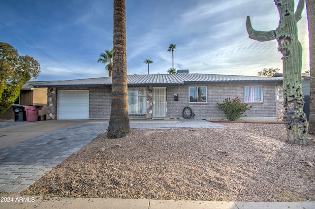 ranch-style house with a garage