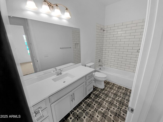 full bathroom featuring toilet, tile patterned flooring, shower / washtub combination, and vanity