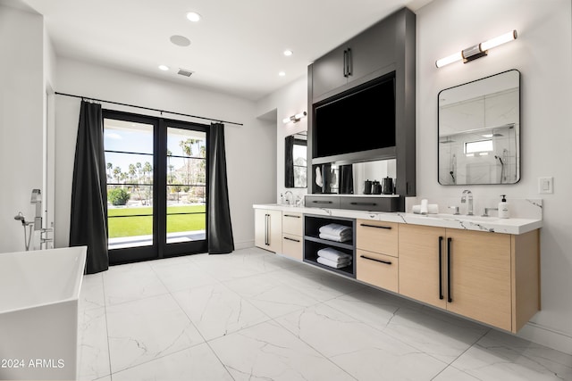 bathroom featuring vanity and shower with separate bathtub