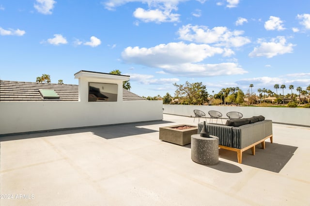 view of patio / terrace with a fire pit