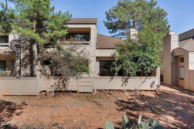 1380 Vista Montana Rd Unit 22, Sedona, AZ 86336 - back of property featuring a shingled roof