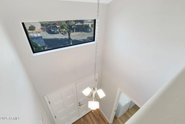 1380 Vista Montana Rd Unit 22, Sedona, AZ 86336 - bathroom featuring wood finished floors and a towering ceiling